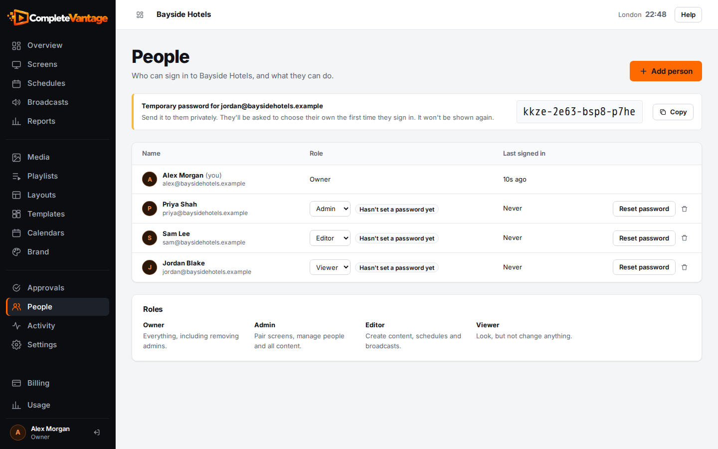 The People page with the temporary password for a new person